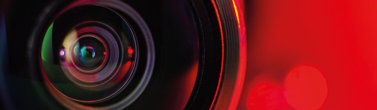 Camera Lens On Red 1198X350